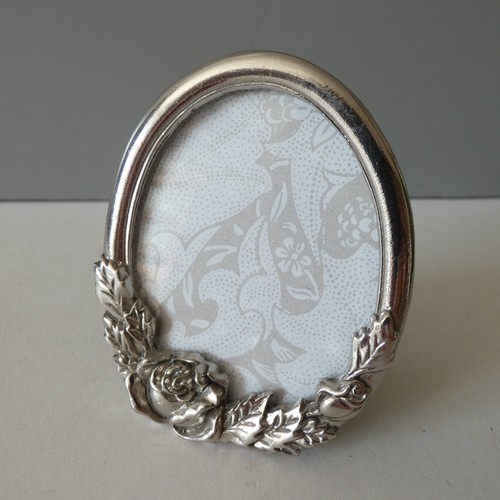Silver tone metal oval - oval, photo